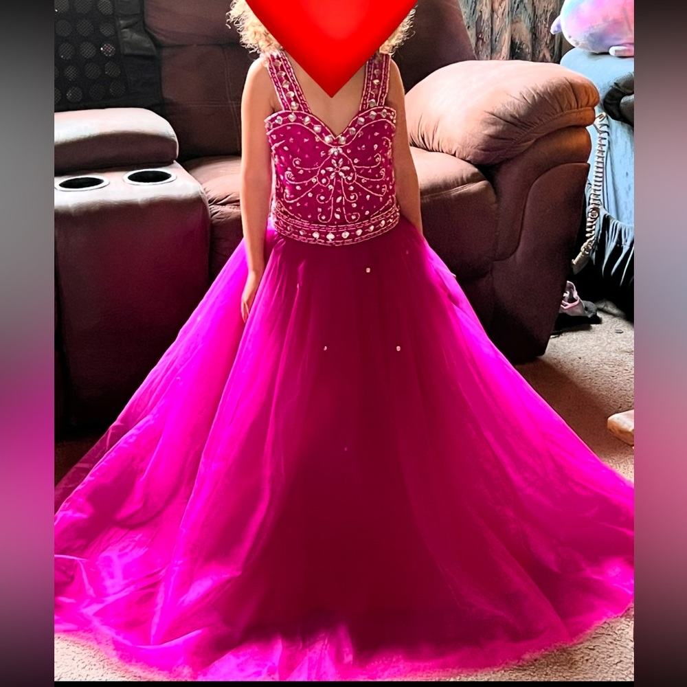 Fuchsia colored ballroom gown for little girl